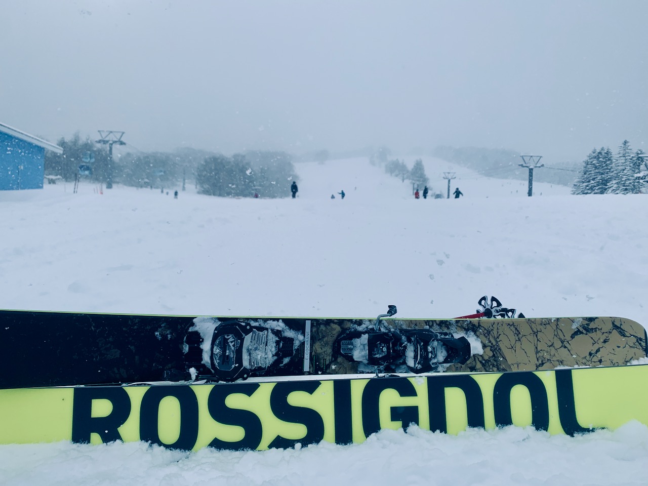 Rossignol skis in front of gondola lift