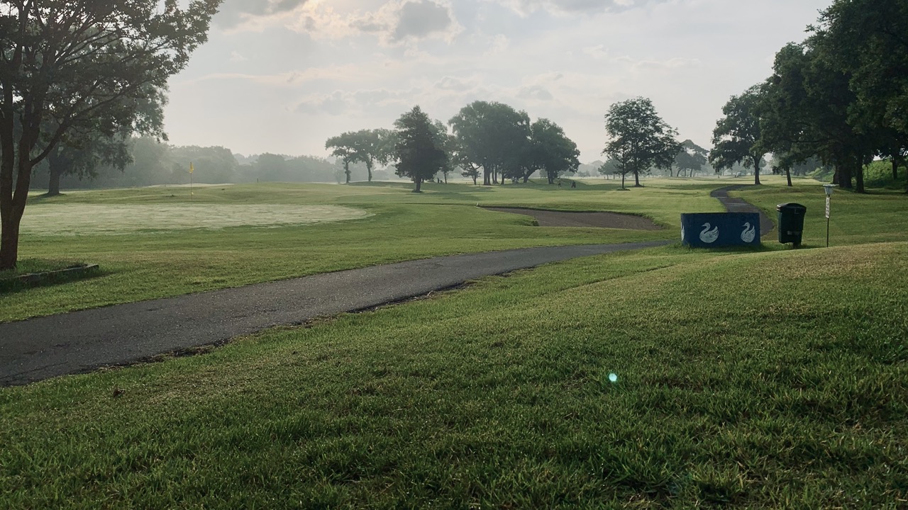 View of green on Hole 4 from tee ground of Hole 5 at Kitakami Shimin.